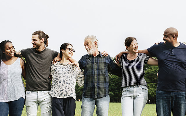 Group of people embracing mental health care