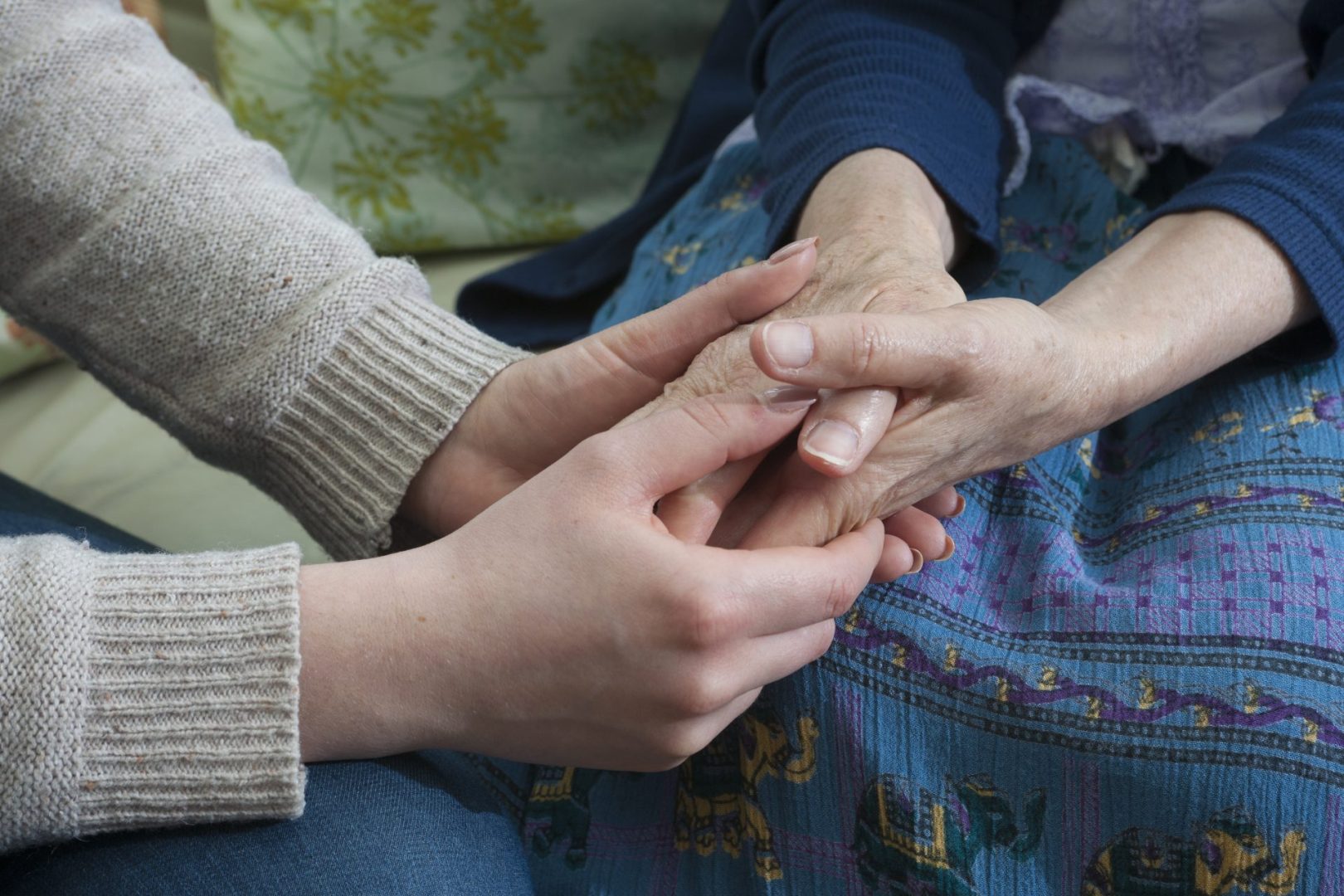 close up of two pairs of hands