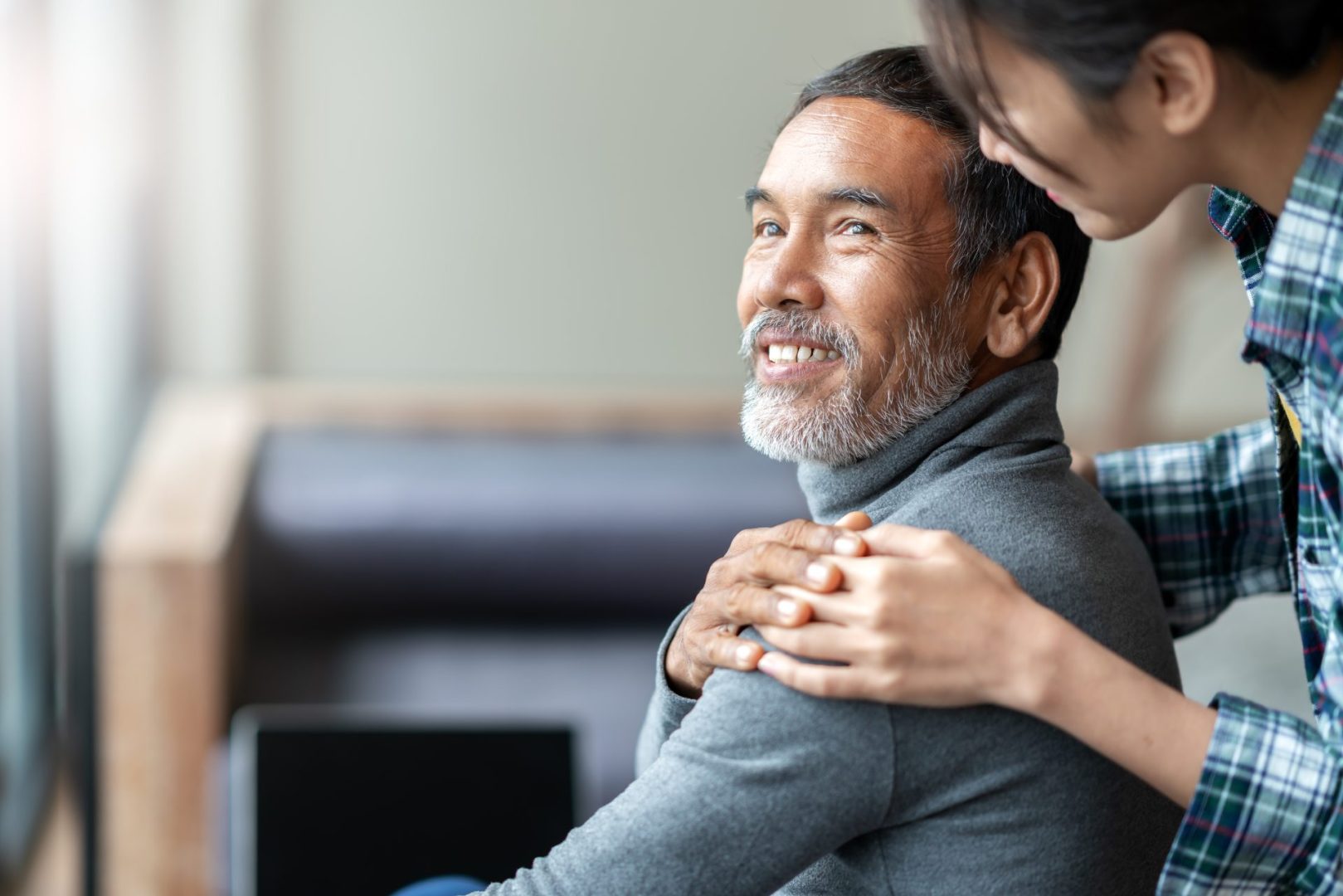 Man speaking with live in carer