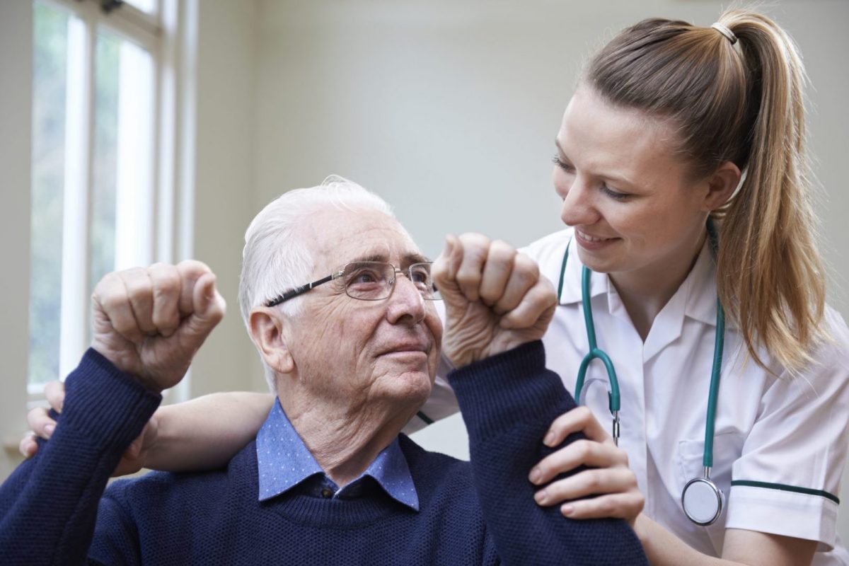 an elderly man receiving stroke care